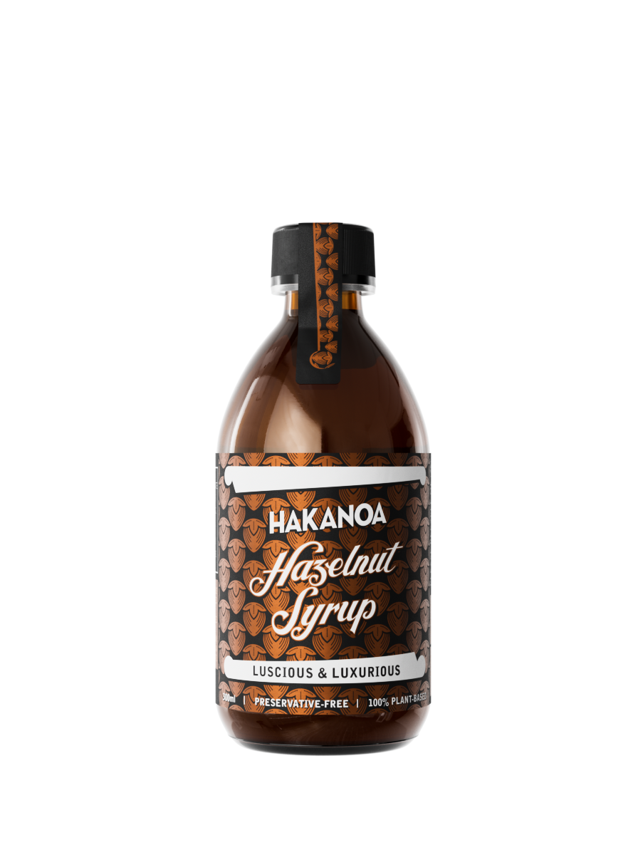 Bottle of Hakanoa Hazelnut Syrup on a white background