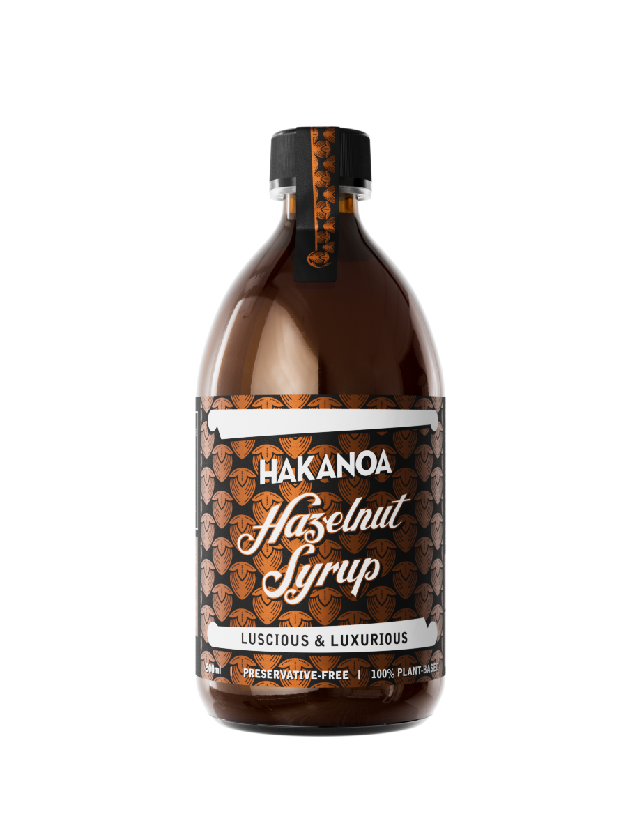 Bottle of Hakanoa Hazelnut Syrup on a white background