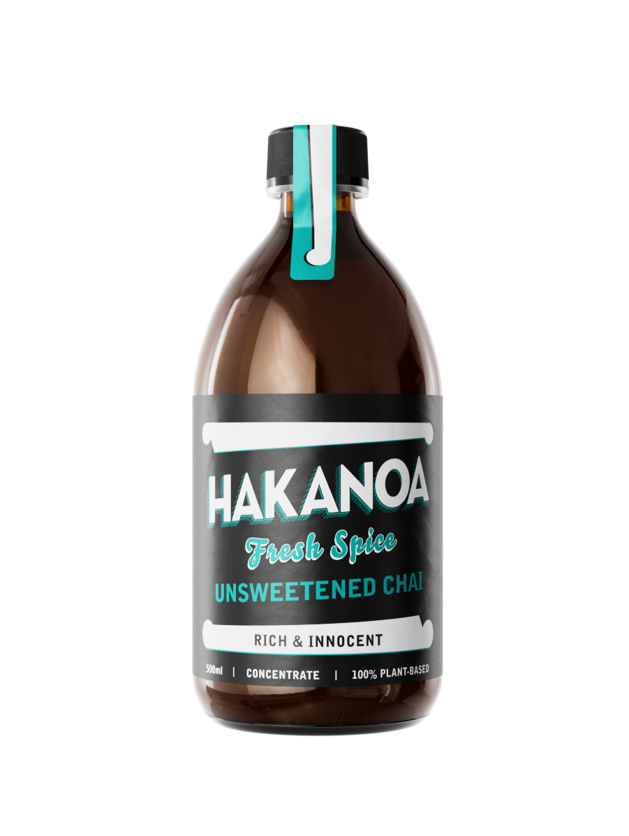 Bottle of Hakanoa unsweetened chai concentrate on a white background